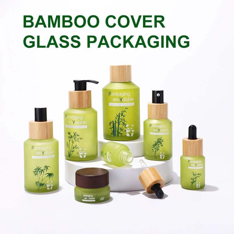 Fancy label frosted green glass bottle jar for face scream skin care lotion products with bamboo wooden lid bottle manufacturing