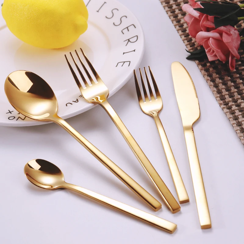 gold cutlery sets (4)