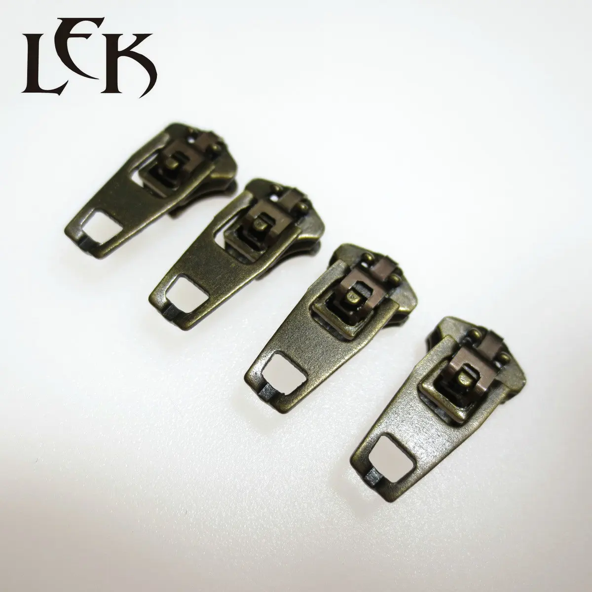 Hot selling professional manufacture lowest price antique brass 4.5YG iron slider zipper