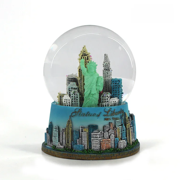 Custom made artificial glass snow globe balls with cities for wholesaler With music water globe customization Suppliers
