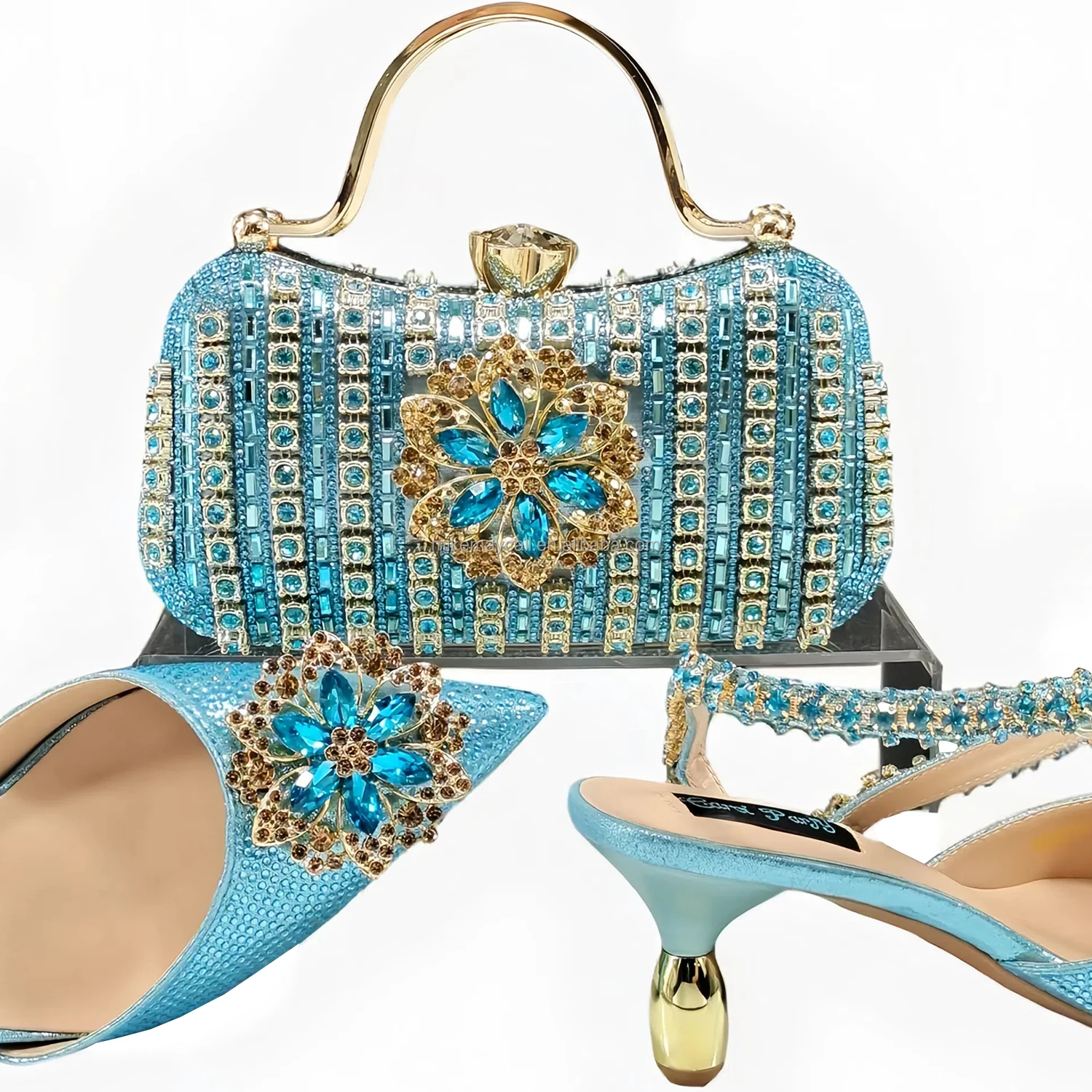 Latest shoes and matching bags with emerald snowflake diamond design are suitable for winter