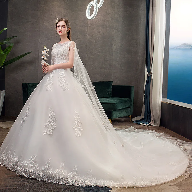 Luxury long tailed bride princess dream white lace wedding dress