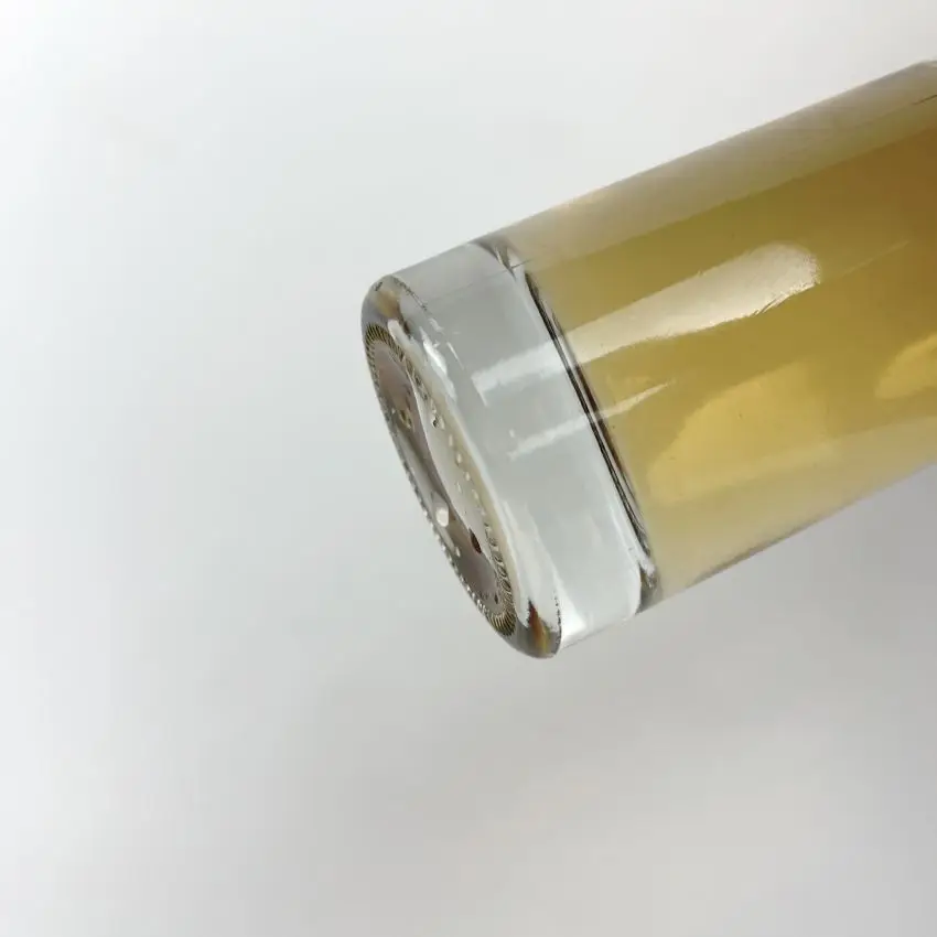 Long clear cylindrical glass alcohol bottle with thick bottom 500 ml