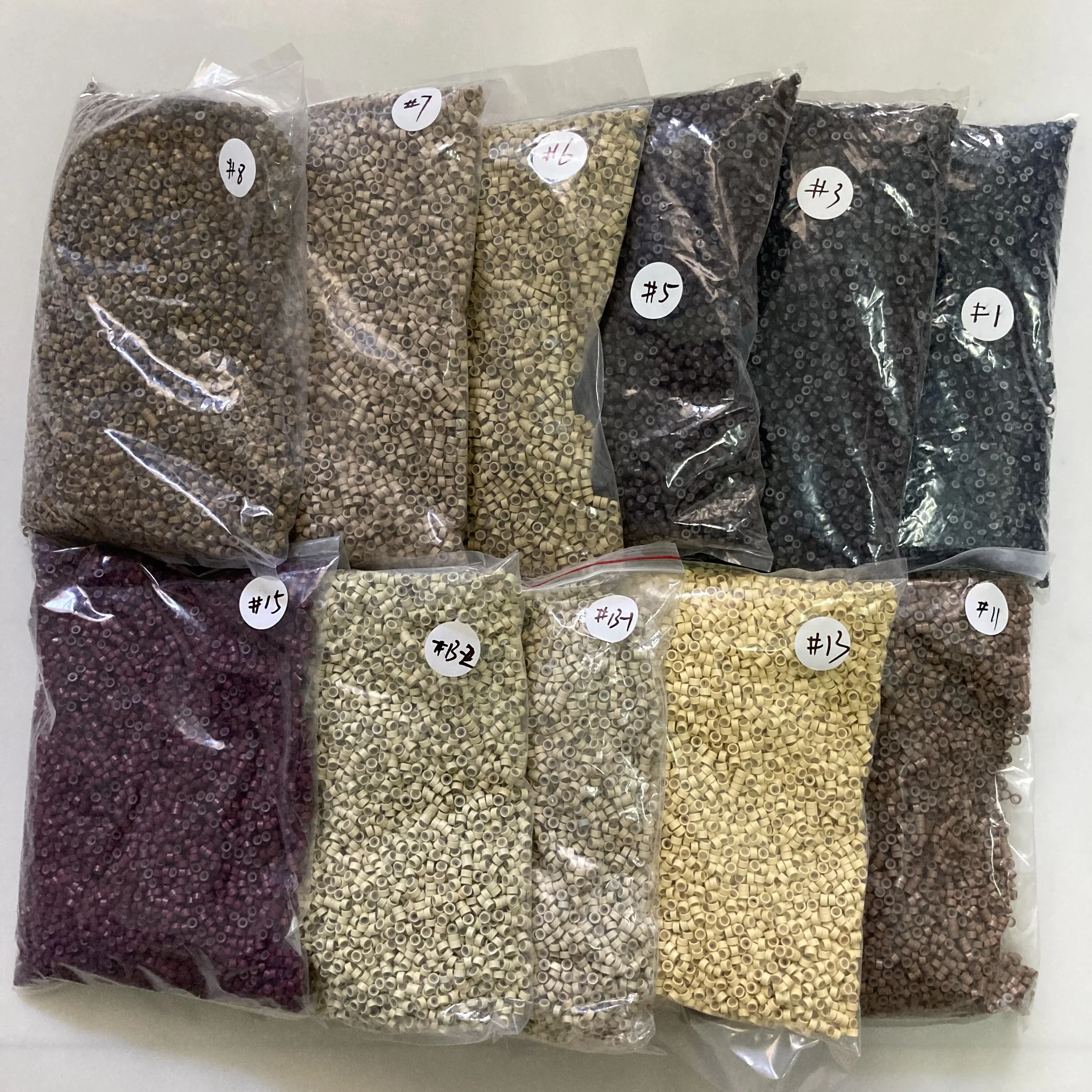 5mm metal hair extension silicone rings 10000pcs per bag  hair extension beads with silicone lined hair extension beads