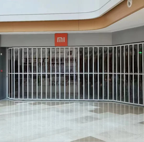 custom High-end brand cosmetics store door beautiful transparent pvc crystal aluminum alloy reinforced material folding door
