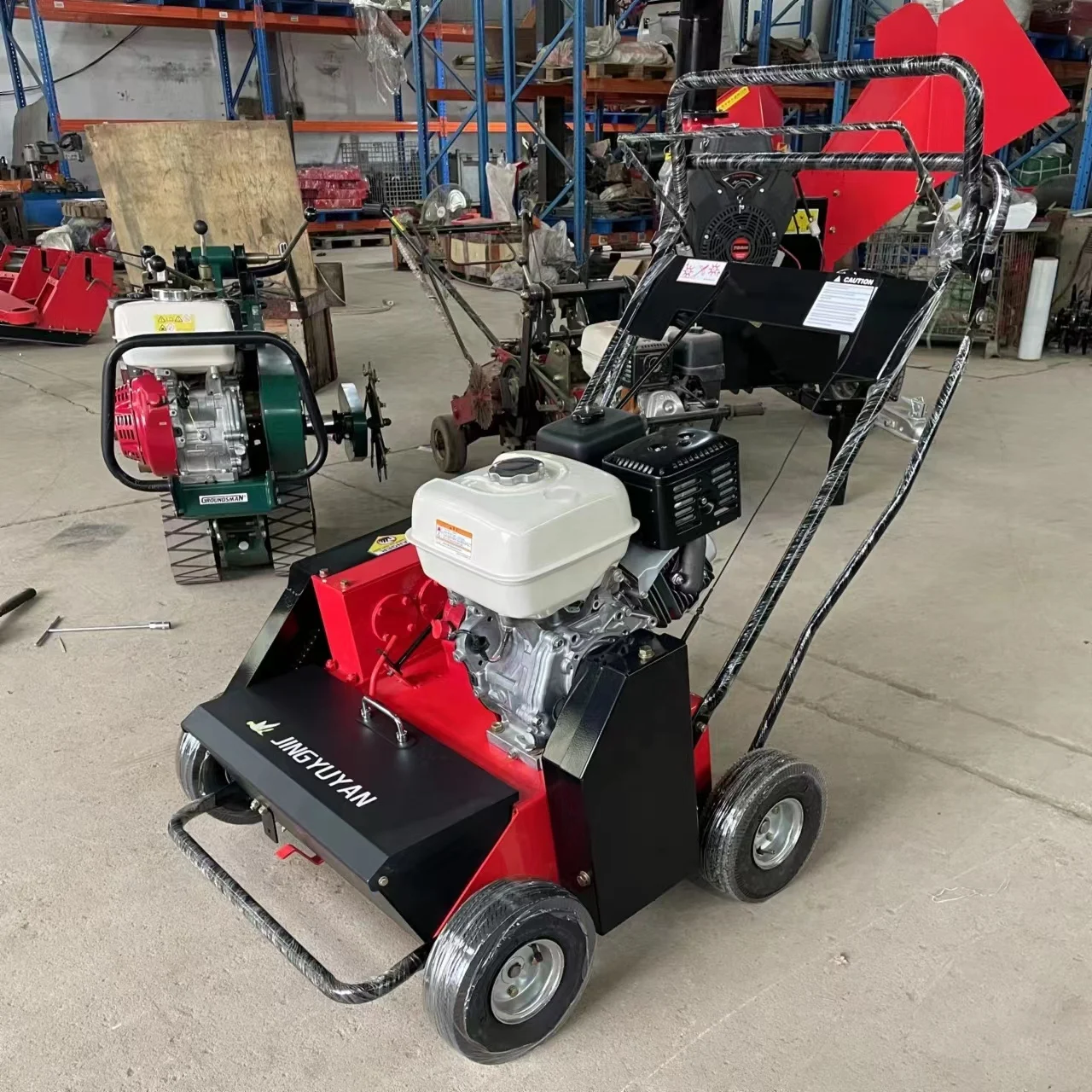 Turf comb machine with manual push to remove dea d grass