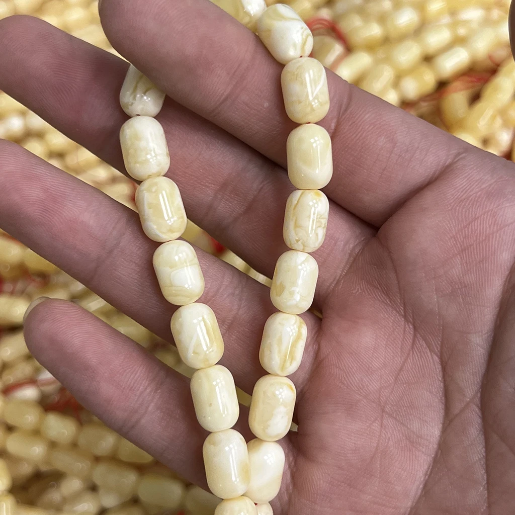 Natural Russian amber jewelry with high-quality white tiger skin and yellow pattern capsule shape 6-8mm Muslim prayer beads