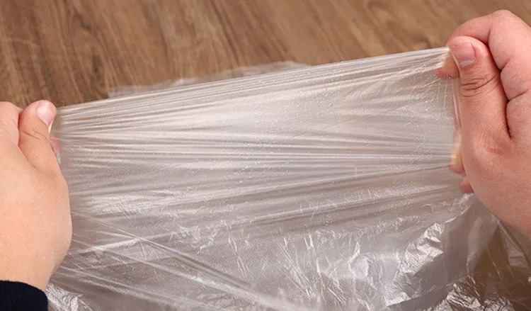 Wholesale price disposable PE plastic waterproof apron for salon kitchen