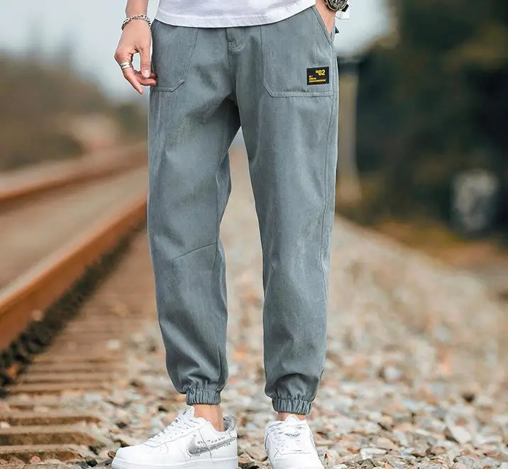 
2020 Autumn/winter plus fleecy pants for men loose-fitting sport long pants with thickening and large size corset overalls for m 