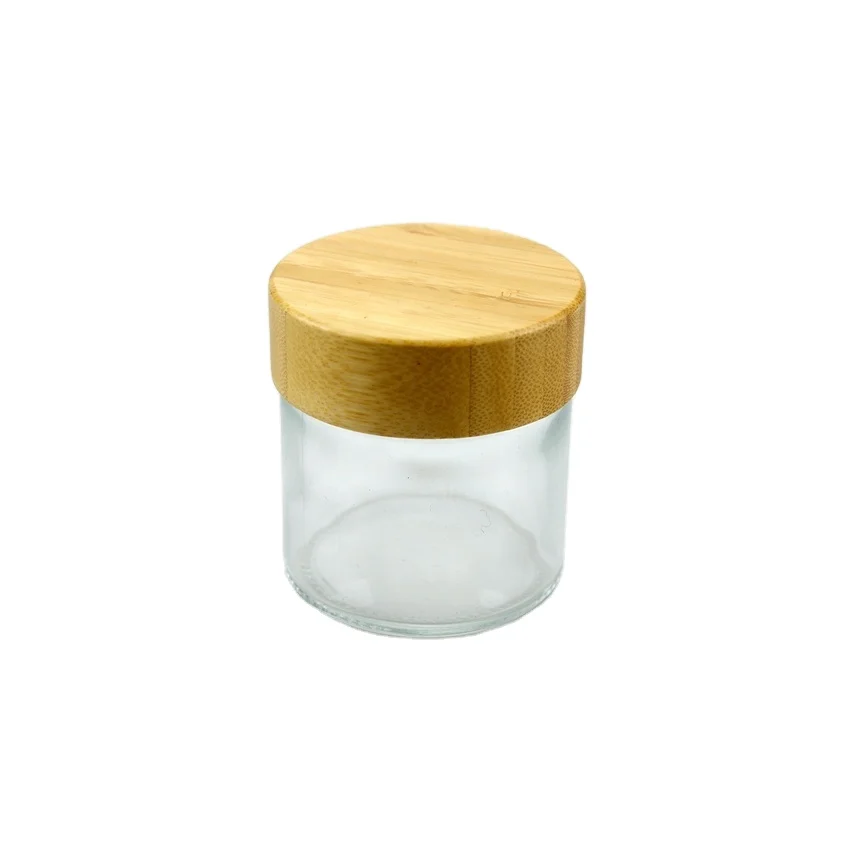 
Wholesale 1oz 2oz 3oz 4oz 5g 7g 9g child proof bamboo lid with glass jar/container with childproof lid 