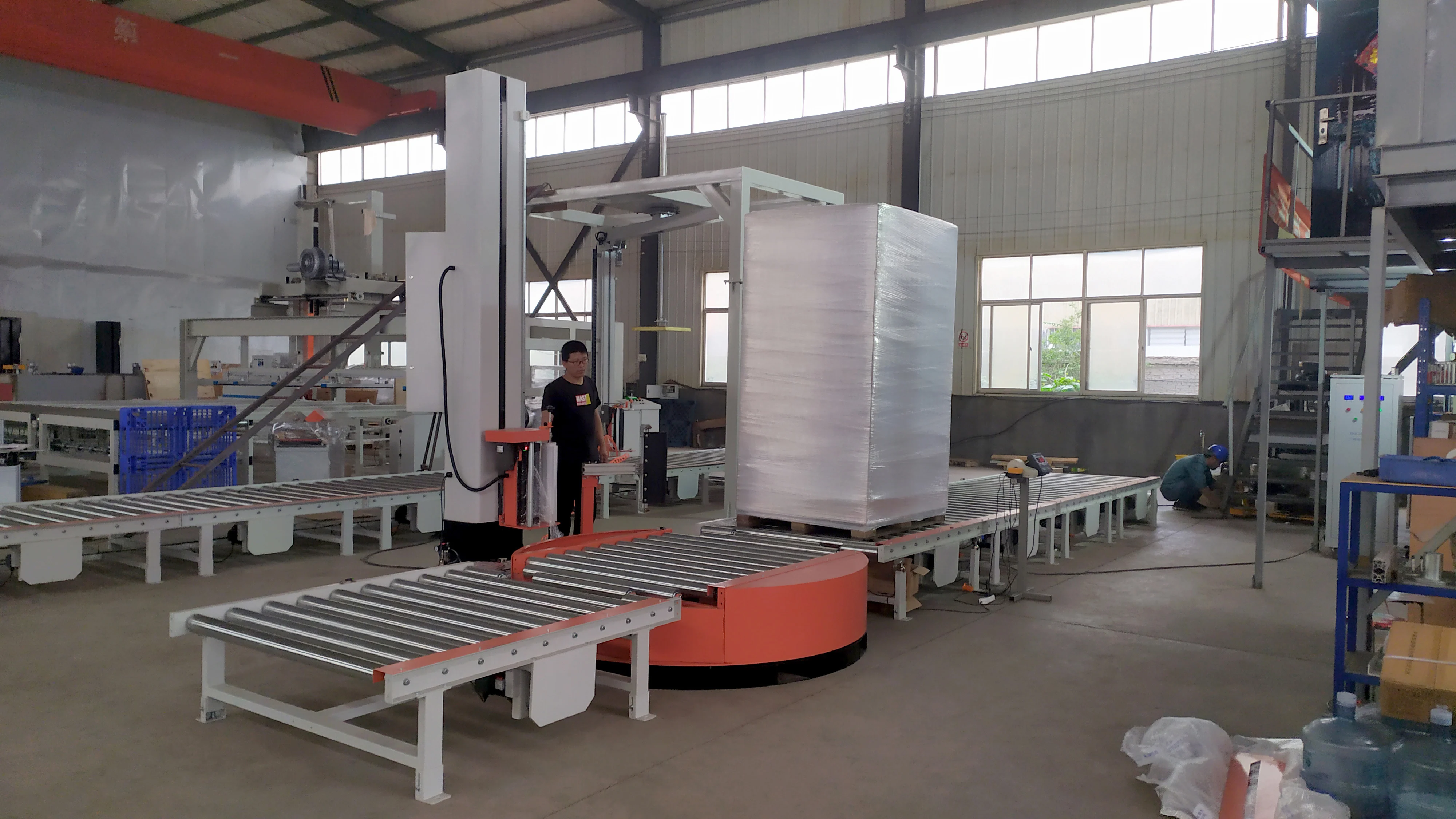 UCR-T2000A Conveyorized Automatic Turntable Pallet Stretch Wrapping Machine