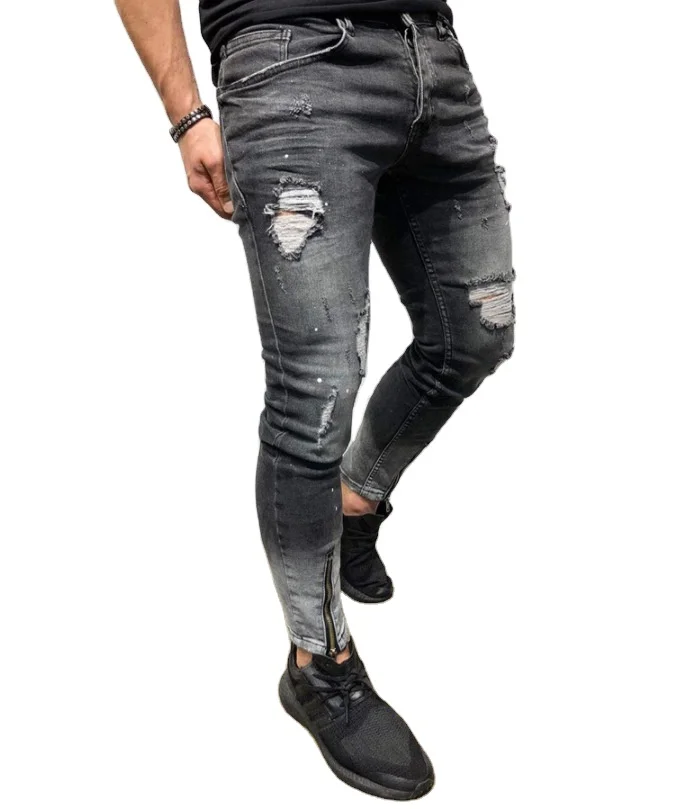 The New Cross-Border Fashion Ripped Jeans of Europe and America for Young Men with Foot Opening Zipper and Elastic Small Feet