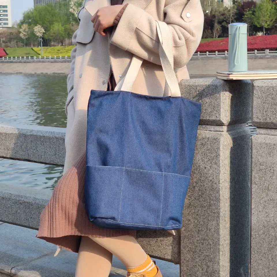 Hot Sale Denim Blue Canvas Tote Bag Cotton Webbing Handles With 3 Pockets On The Front Jean Shopping Bag With Cotton Lining