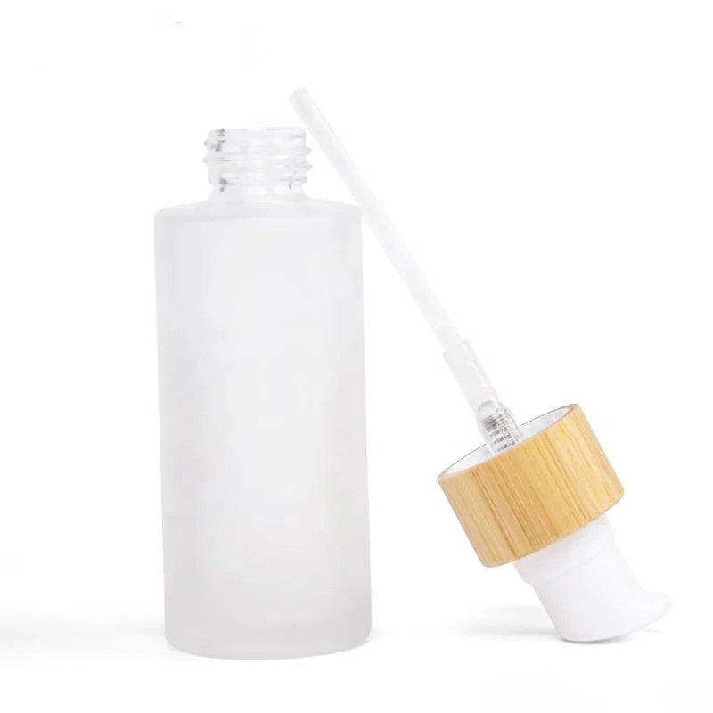 Orgontic New Developed Frosted Wooden Bamboo Cap Round Transparent 10ml 30ml 50ml Glass Bottle With Lotion Pump