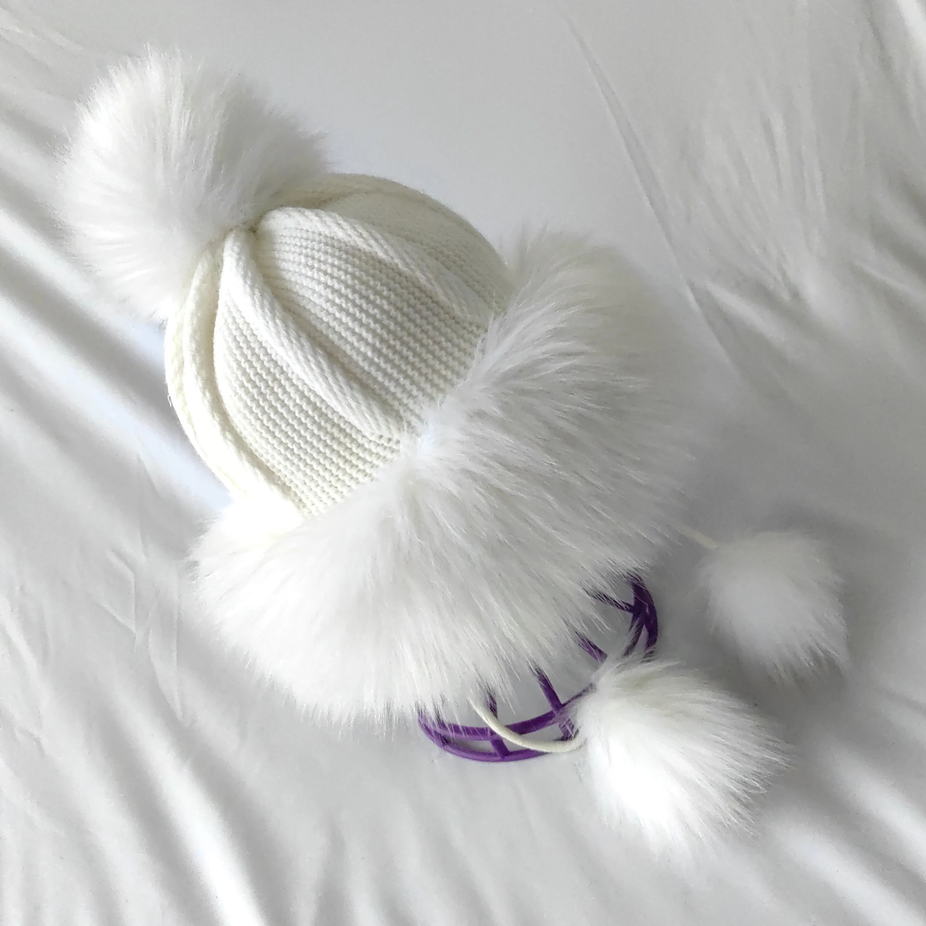 The factory supplies artificial wool cold-proof noble hair ball warm children knitted hat