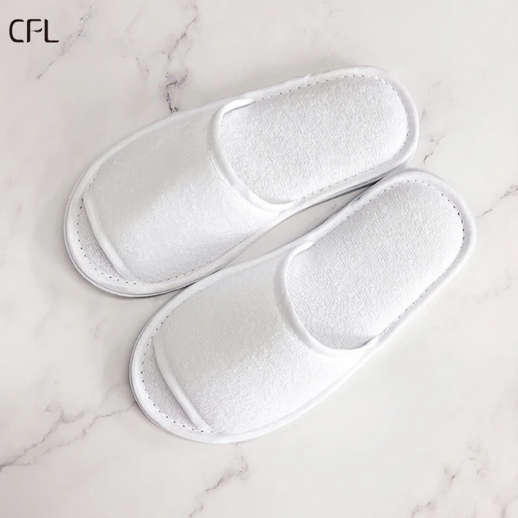 low price Spot light plate half bag towel cloth machine slippers for hotel disposable travel slippers