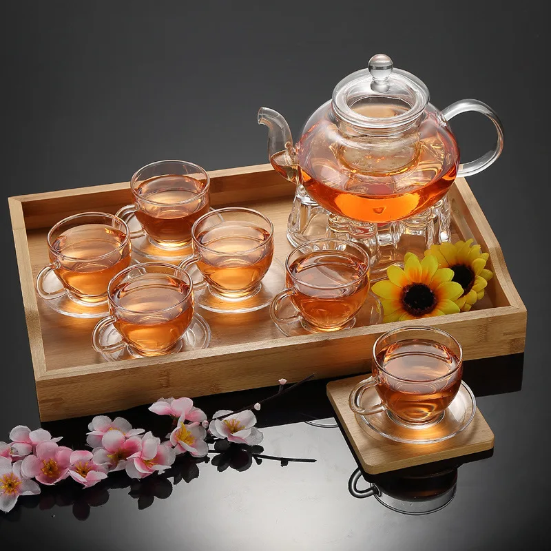 
Borosilicate Gongfu Tea Flowering Glass Teapot Set with 6 cups and pot warmer 