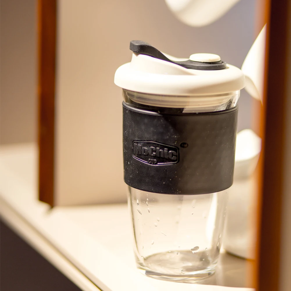 
Eco-Friendly Insulation Non-Slip Portable Coffee Milk Tea Transparent Glass Cups With Silicone Cover 
