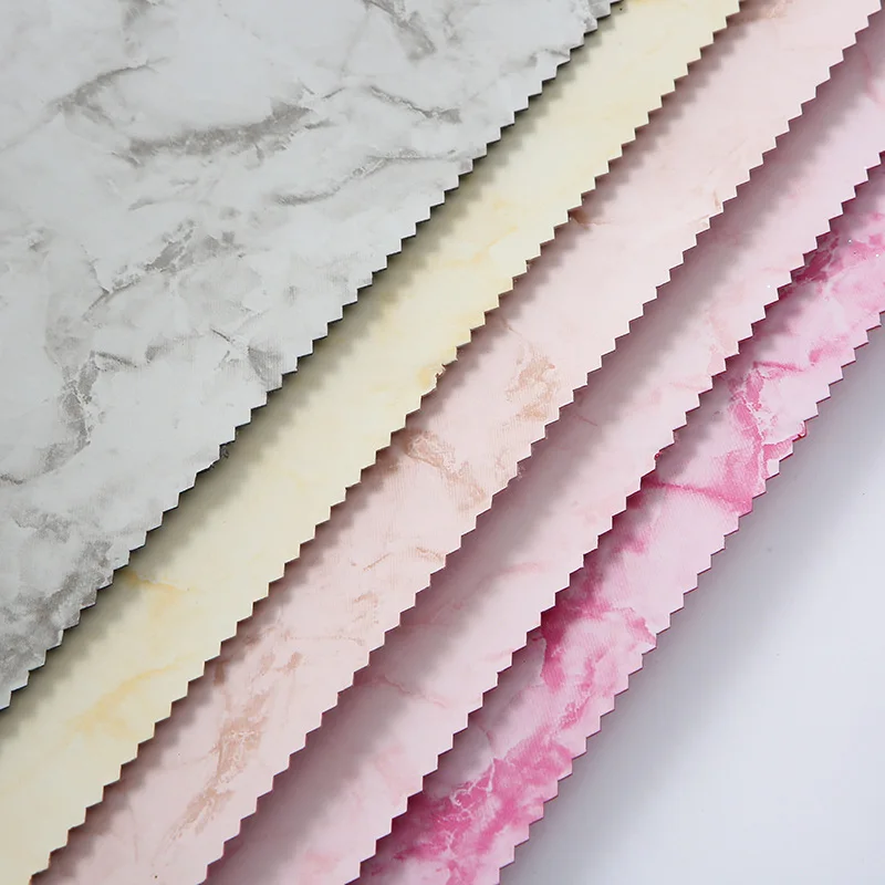 OEM/ODM Qiaoyang custom pu spunlace bottom leather fabric compression marbling leather