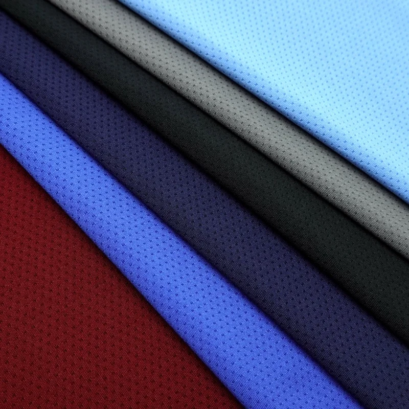 Quick dry 97/3 polyester spandex solid knit custom eyelet mesh jersey sports wear fabric for tshirts