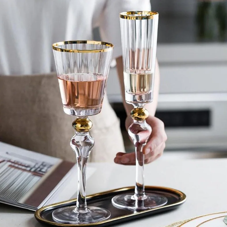 Crystal high ending hand made wine and champagne glasses with pattern design and golden rim and stem daily production items
