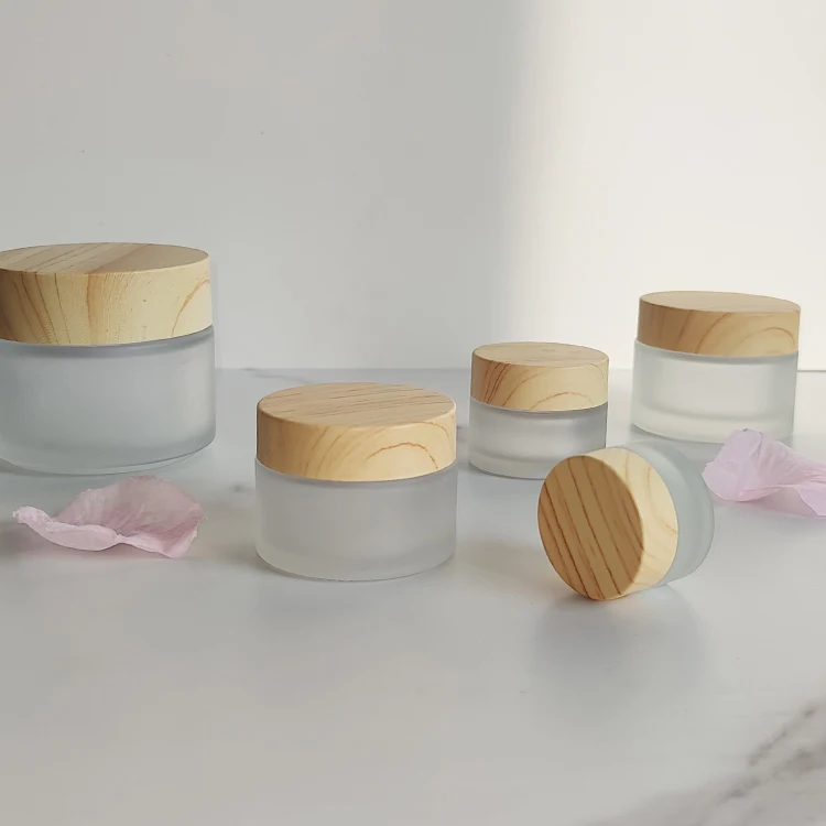 Wholesale 5g 10g 15g 30g 50g 100g cream skincare packaging white frosted glass jar with bamboo Plastic wood grain