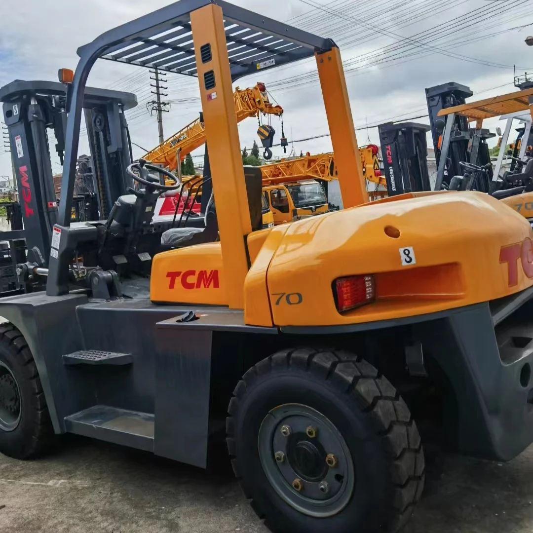 Подержанный TCM 7ton вилочный погрузчик в хорошем состоянии для продажи сделано Японии желтый цвет б/у