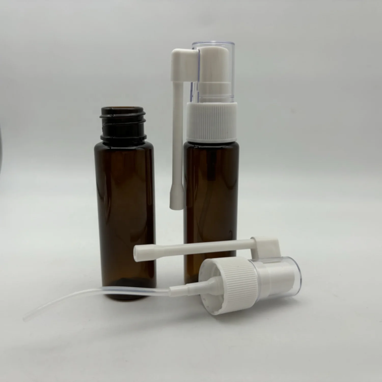 High Quality   30ml  Brown  Plastic  Spray  Bottle  with  360  Degree Rotation Atomizer  For  Travel  Home  Use