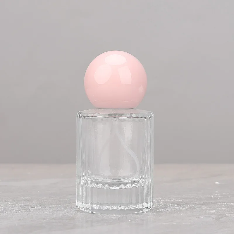 Wholesale 30ml Cylinder Fragrance Glass Bottle 50ml Transparent Vertical Line Round Perfume Spray Bottle with Round Ball Cap