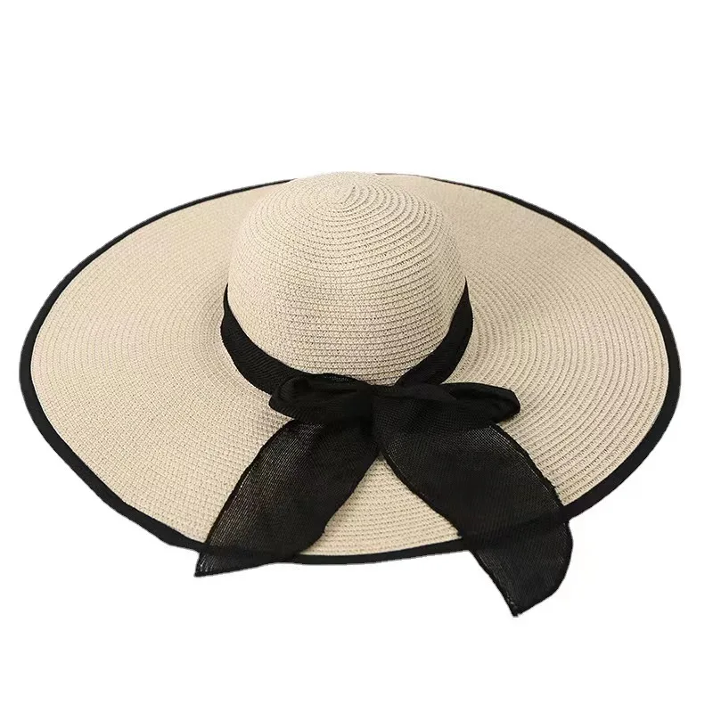 2022Summer new straw hat bowknot sunshade big hat along the ladies beach sunshade big straw hat manufacturers wholesale