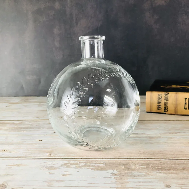 Ball Shape Whisky 750ml Custom Embossed Clear Glass Liquor Bottle