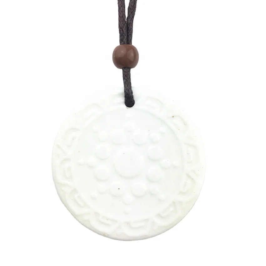 
Wholesale price Ceramic scalar energy pendant chain with three stones on the opposite side of a sunflower for health care 