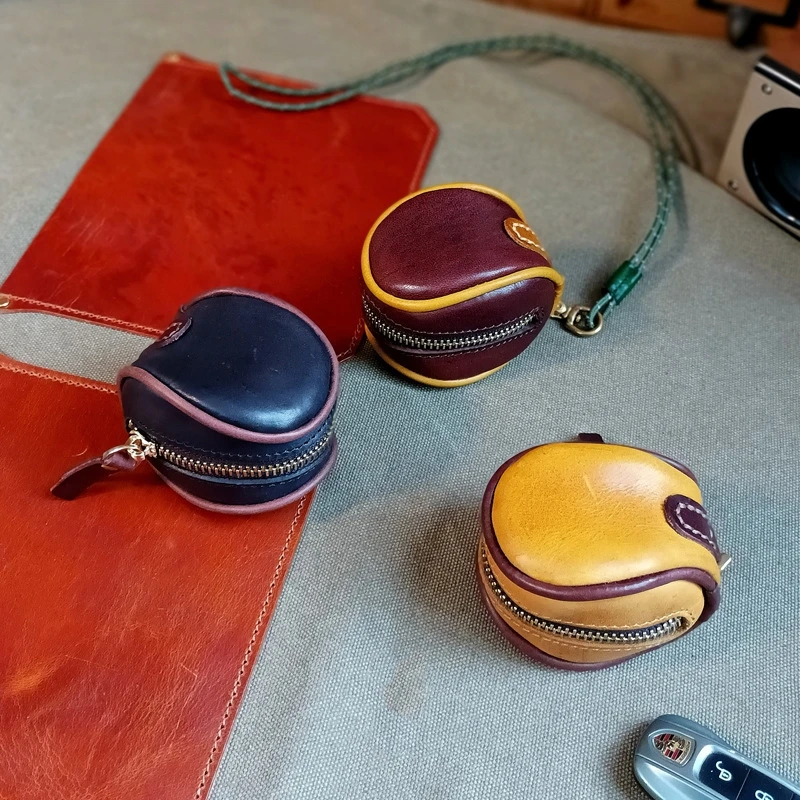 2024 Wholesale leather retro compact cowhide earphone storage bag men and women genuine oil waxed leather mini coin wallet purse