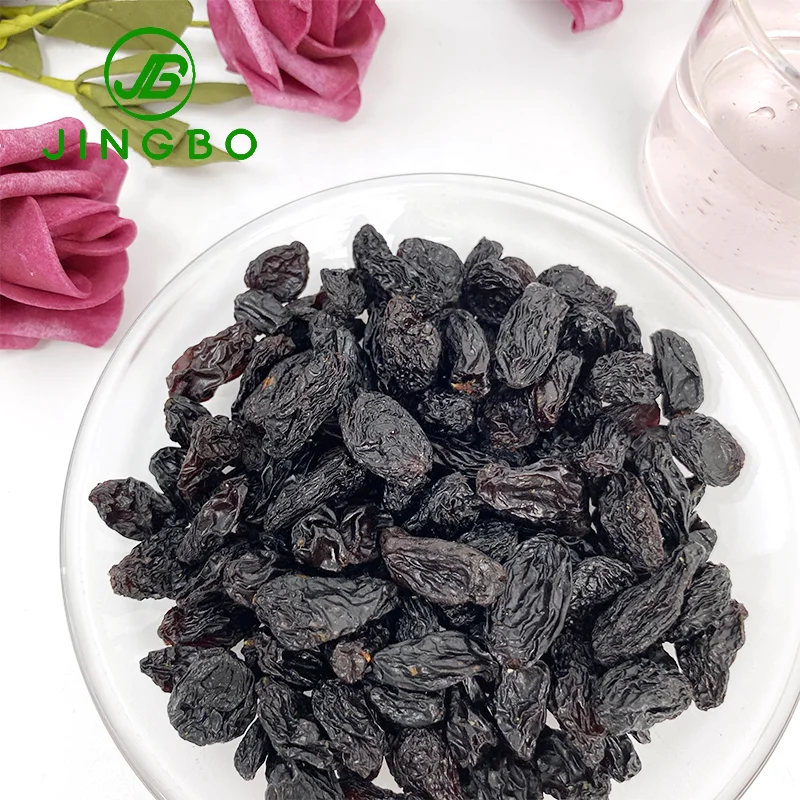 Оптовая продажа высококачественный сушеный виноград с богатым вкусом насыщенное сладкое питание органический черный изюм.