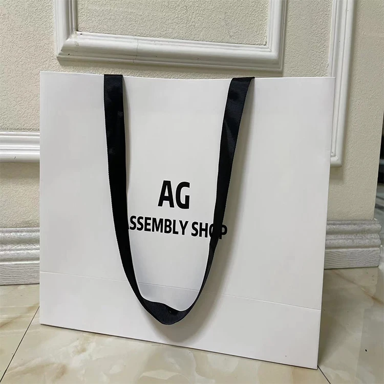 Customized Designer Logo Printed Shopping Paper Bag Luxury Packaging Bags for Gift Wrapping