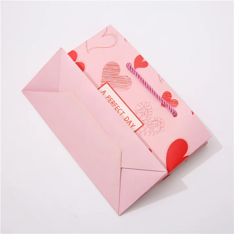 Gonhua Wholesale Luxury Gold Foil Pink Kraft Packing Paper Bag With Ribbons Custom Logo Gift Printed Shopping Bag