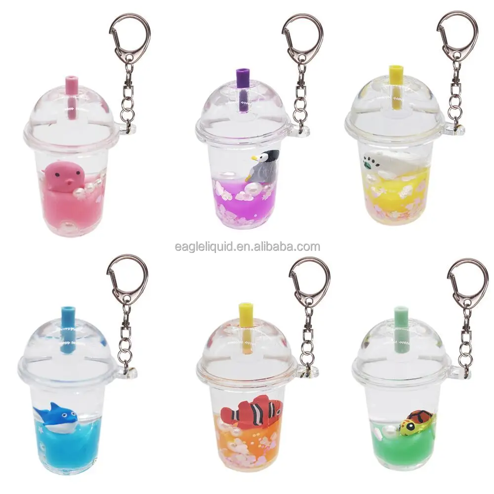 ins summer hot fruit doll drink milk tea into oil keychain quicksand pendant floating bottle wholesale acrylic keychain