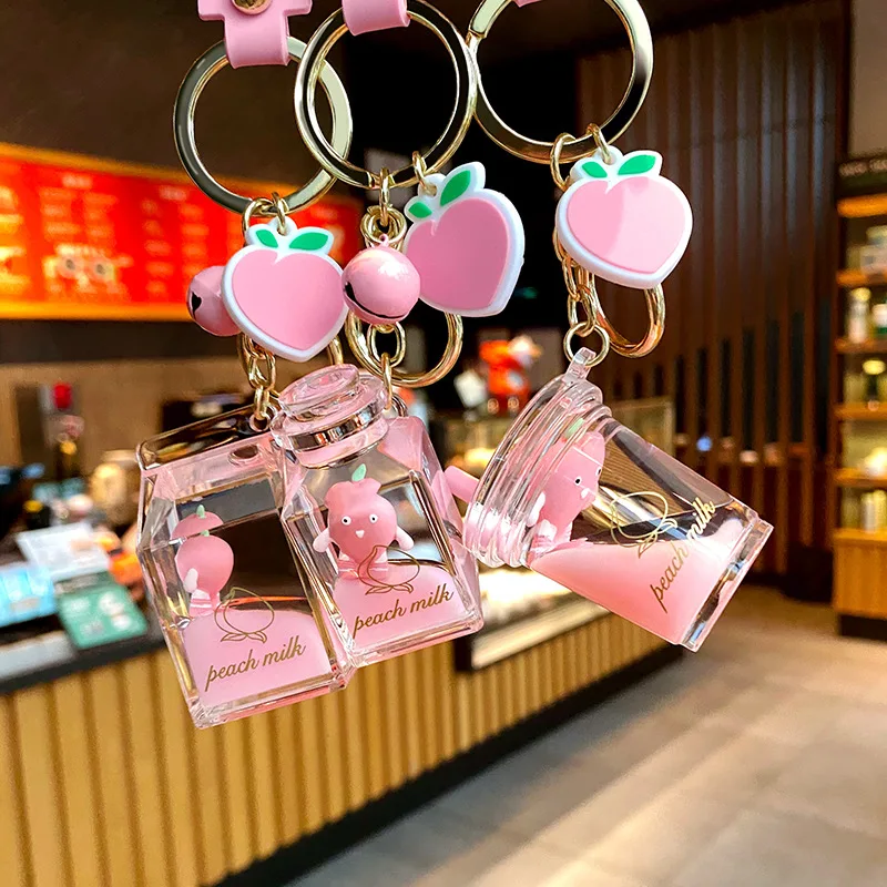 Milk Bottle Crystal Peach Milk Tea Cup Keychain Girl Heart Cute Hair Ball Floating Keychain Bag Pendant Female