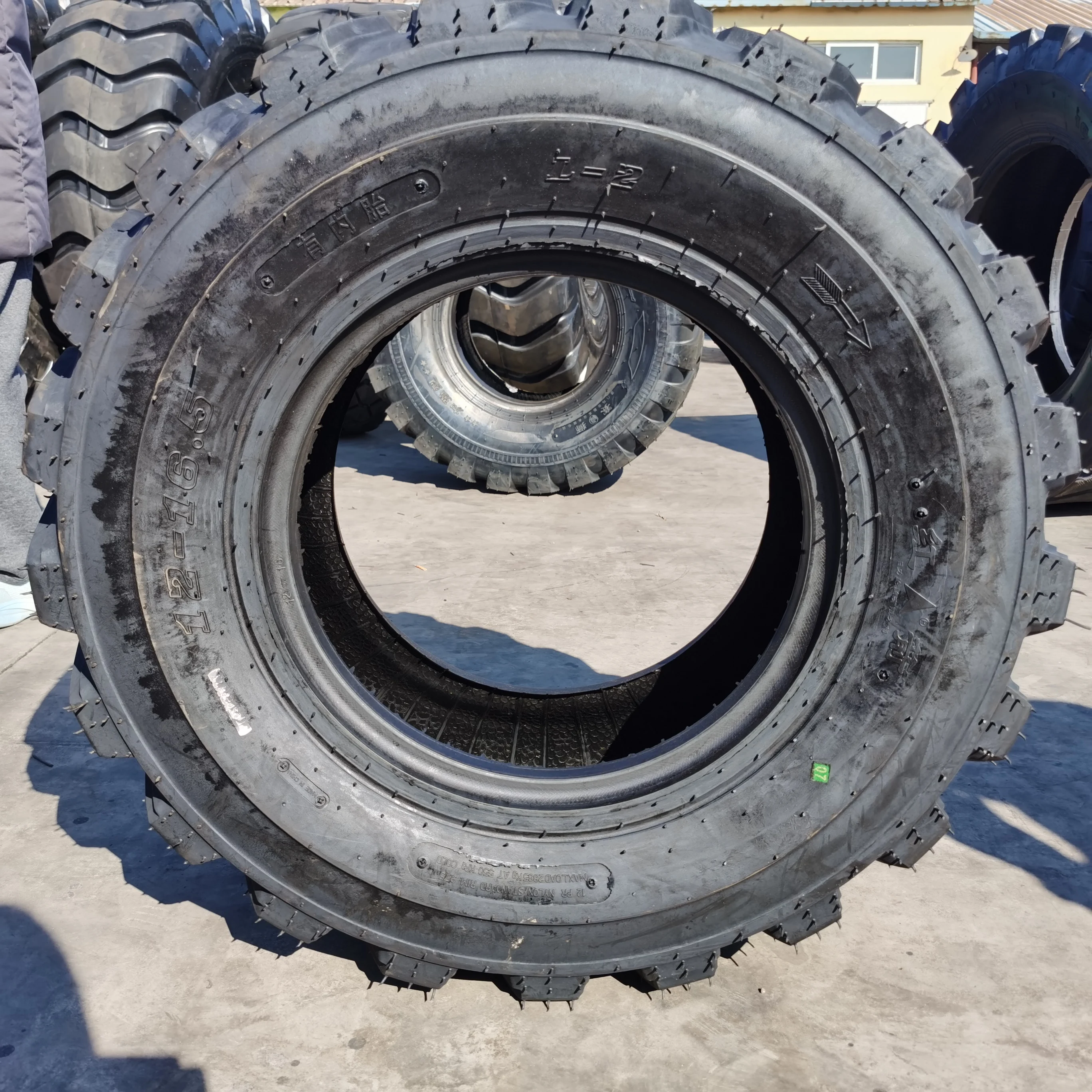 Industrial Tire 12-16.5 Skid Steer Tire Material Origin Type Quality Tyre Low Price