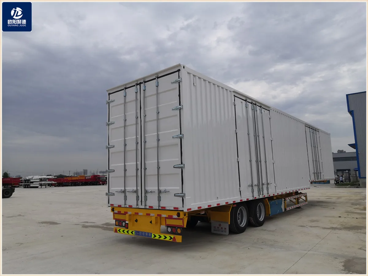 OYJD Trailers new Transnational transport 40ft flatbed trailer van cargo box with 3 brand axles skeleton Chassis