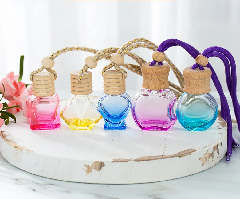 Hot selling colour 10ml car use perfume bottle mini pendant glass bottle aromatherapy bottles with wooden cover