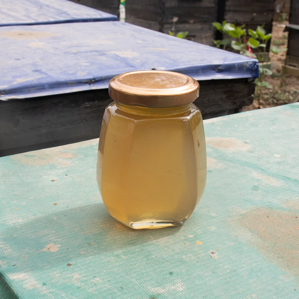 Factory Price Bulk Organic Mountain Raw Natural Honey Miel Amber Honey Jar Royal Honey Natural Flower Mason Jar Packaging 0.25