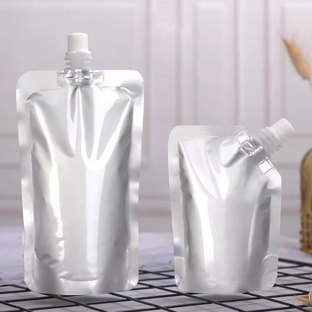 Wholesale 100ml 250ml 300ml 500ml Aluminum Foil Stand Up Pouch With Valve Water Liquid Reusable Food Grade Large Packing Bag