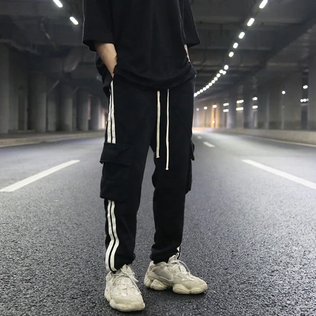 OEM hot sale black side stripe jogger pants casual elastic waist draw string streetwear cotton teen hiphop trousers stock