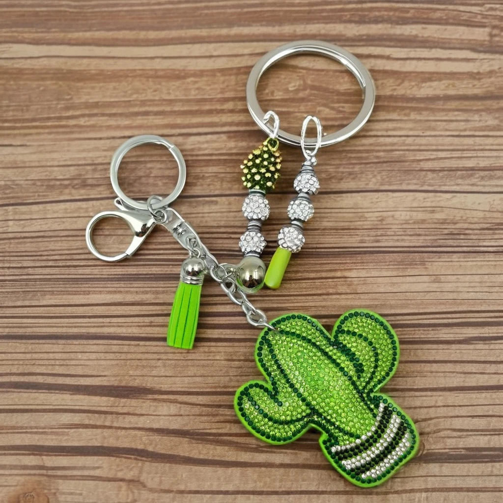 Wholesale luxury rhinestone craftsmanship cartoon cactus keychain exquisite car bag crystal tassel bell pendant gift