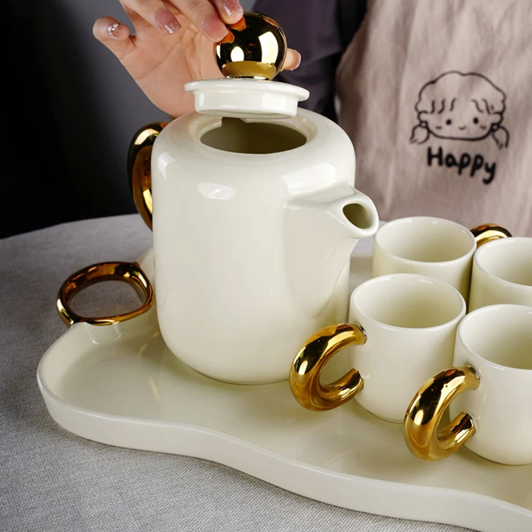 Modern nordic new design luxury gold and white ceramic set of cups tea pot and tray coffee and tea sets