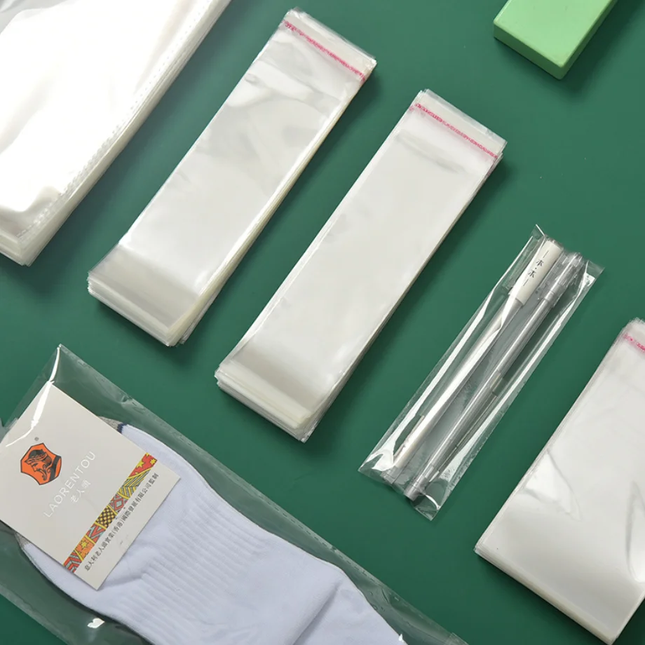 
Gift bag clothes clear opp poly bags with adhesive strip 