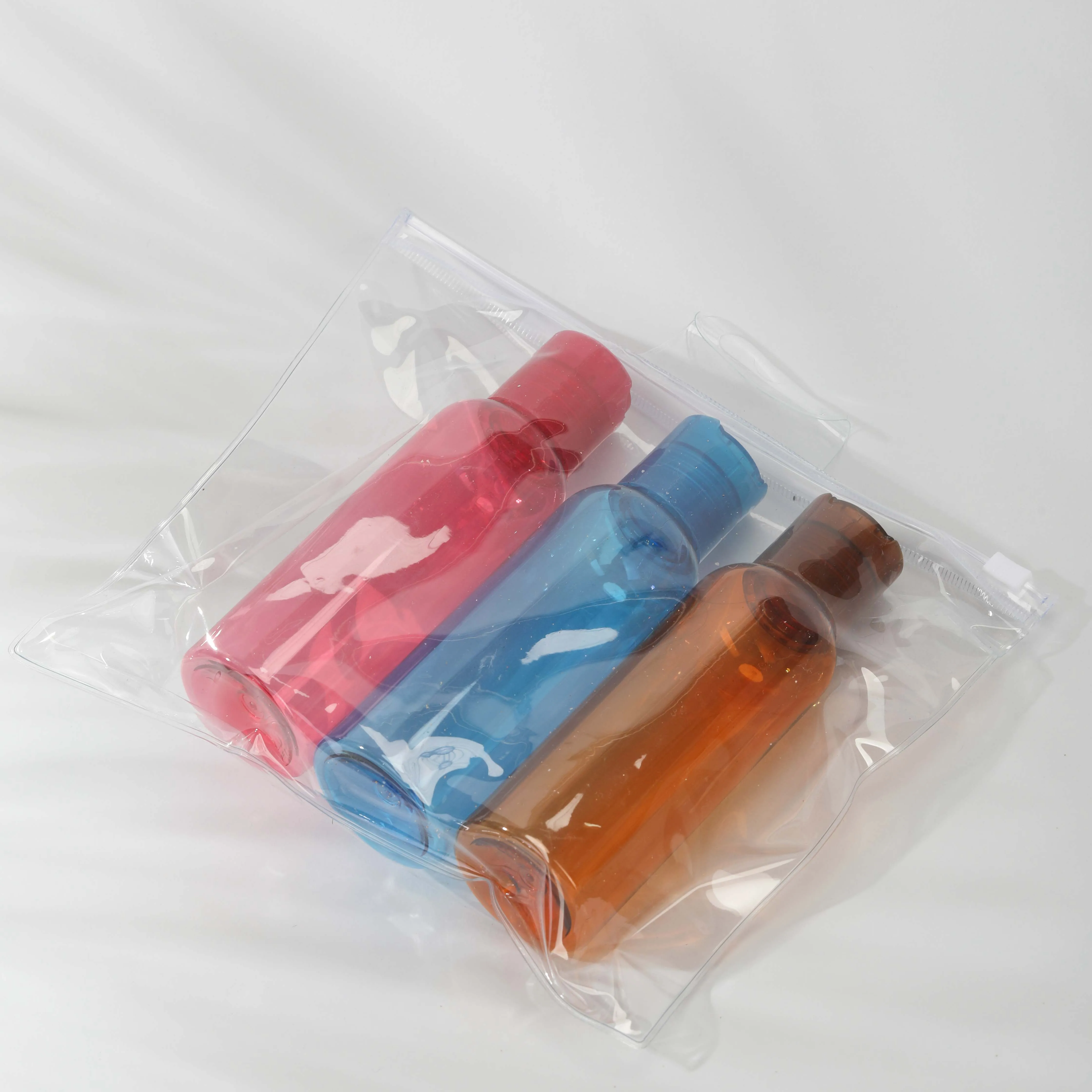 Empty red pink 60ml 120ml 2oz 4oz PET plastic Squeeze Bottles with Press Disc Top for Shampoo Lotion Cream