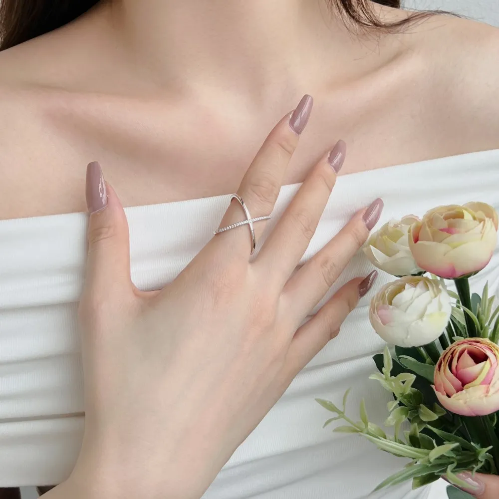 Dylam Simplicity Design 925 Sterling Silver Rhodium Plated Cross Interlock 5A Cubic Zirconia Jewelry Rings for Women Dress Up