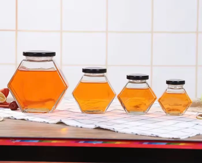 Hot Sale Transparent 100ml 220ml Hexagon Honey Glass Jar 380ml Glass Jars for Honey Storage Food Packaging With Wooden Lid